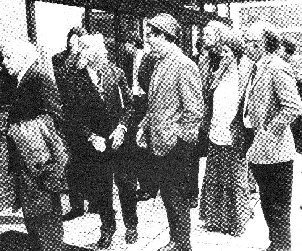 Powys Centenary — L-R: G. Wilson Knight, Angus Wilson, Colin Wilson, Glen Cavaliero (far right), and others